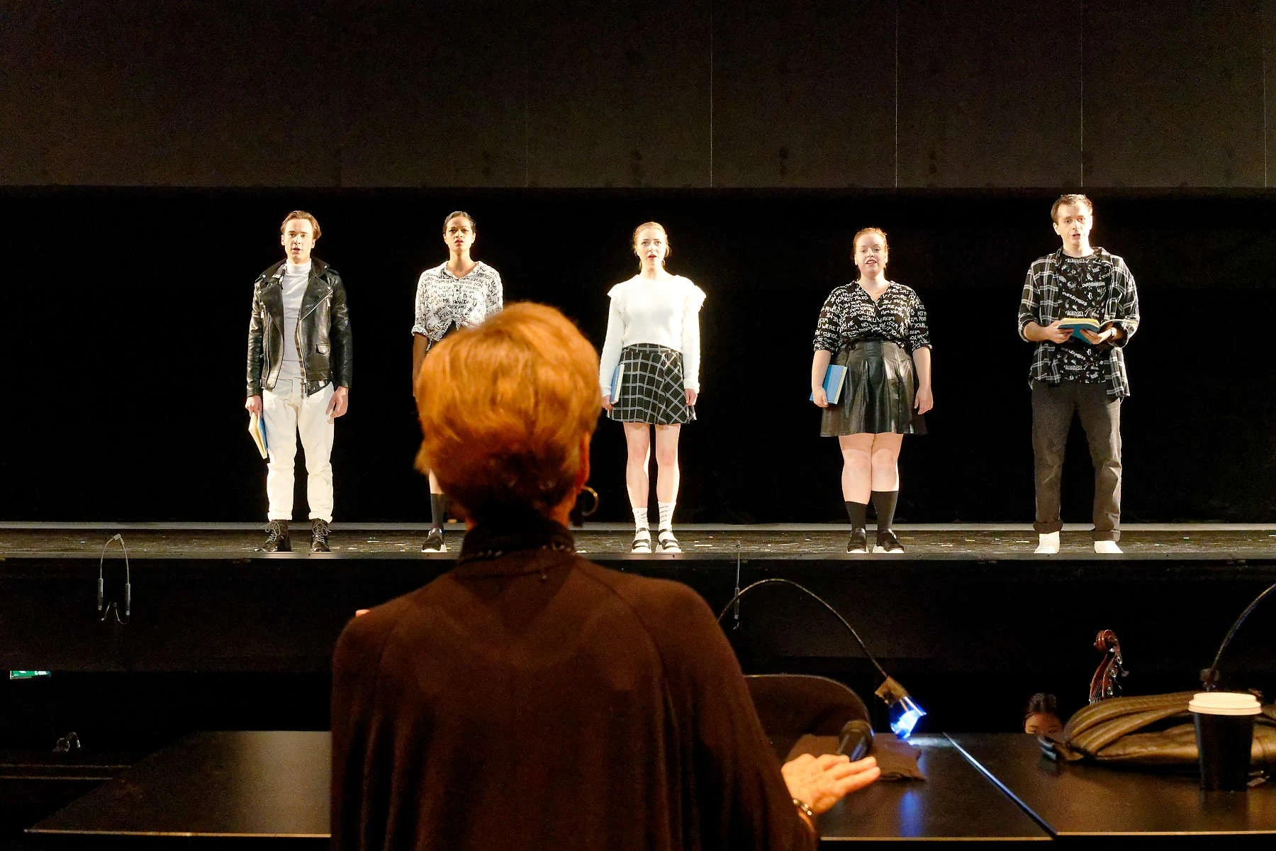 The cast of Die Zauberflöte taking a curtain call