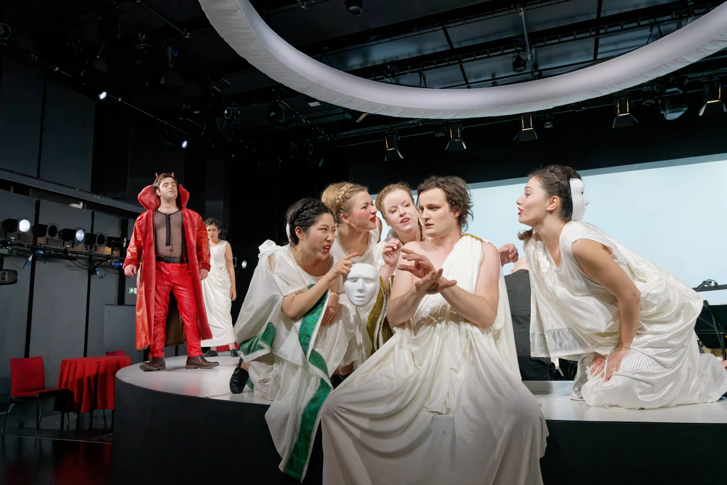 Donata Meyer-Kranixfeld performing in an opera ensemble on stage